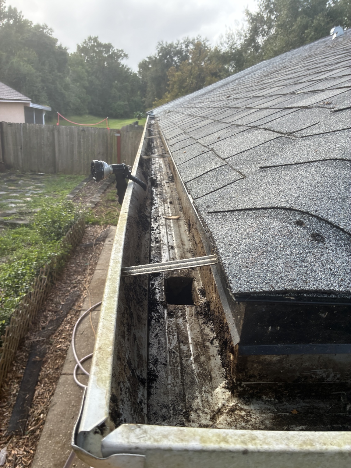 Gutter clearing work in progress