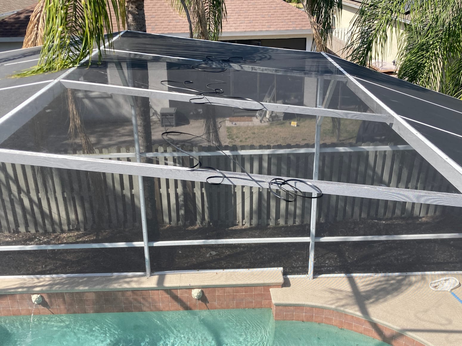 Residential screened pool enclosure and aluminum screen framework