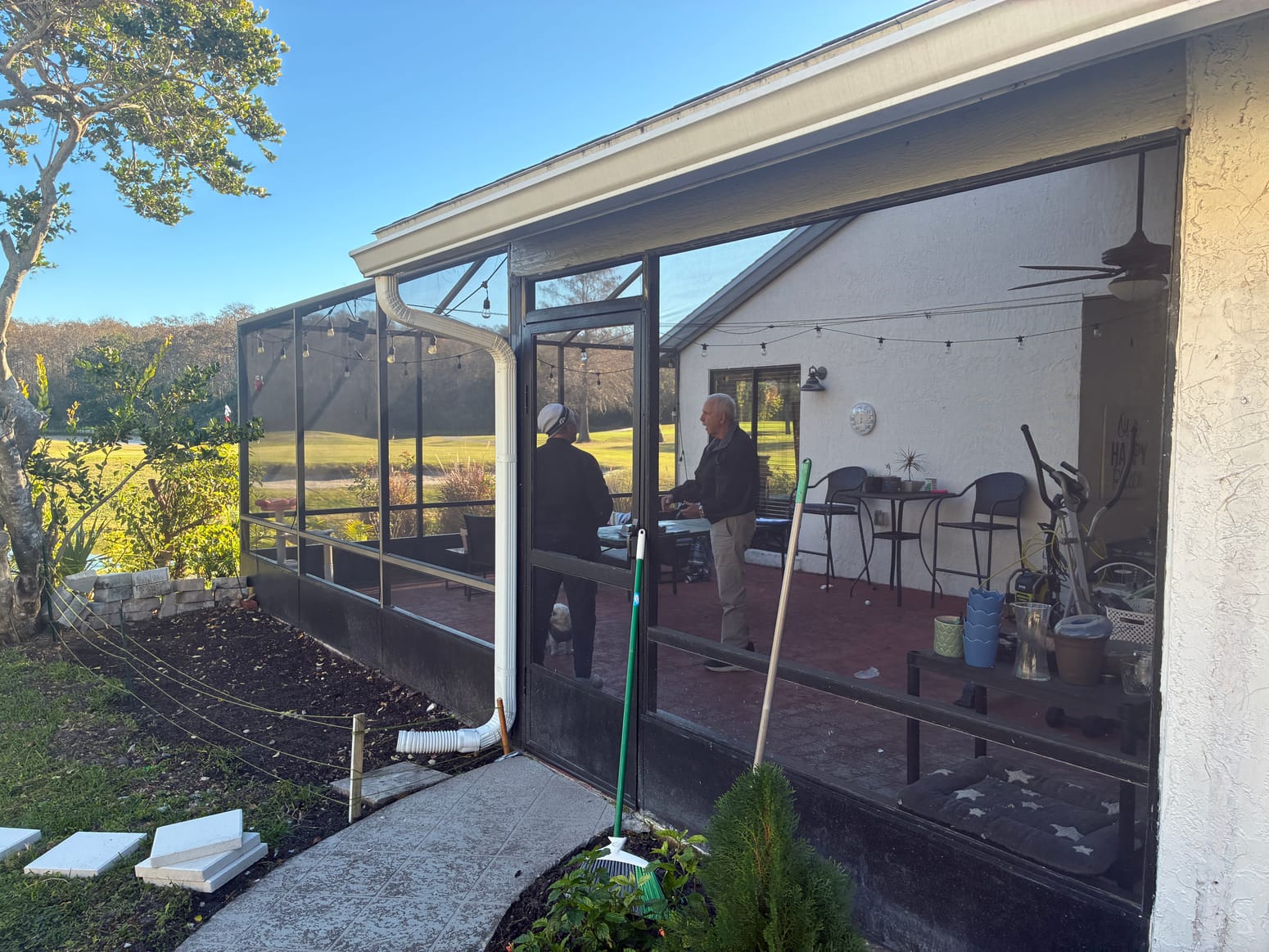 Residential screened pool enclosure and aluminum screen framework